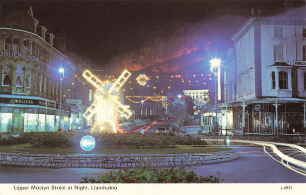 UPPER MOSTYN STREET AT NIGHT, LLANDUDNO - OLD POSTCARD (ref 1578/J/24)