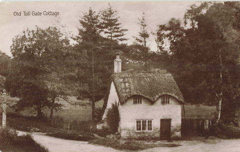 Old real photo postcard of the Old Toll Gate Cottage, Atherstone, Warwickshire