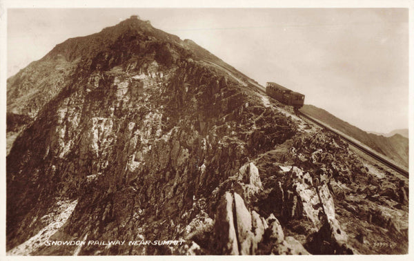 Old real photo postcard of Snowdon railway near summit