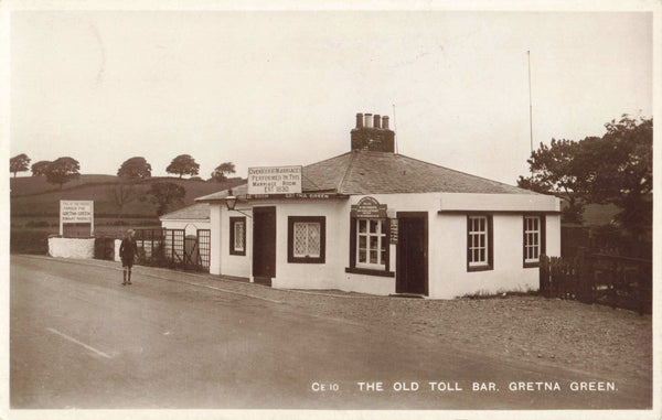 Vintage real photo postcard of the Old Toll Bar, Gretna Green