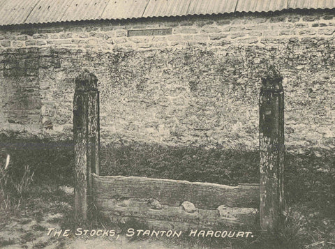 Old postcard of The Stocks, Stanton Harcourt in Oxfordshire