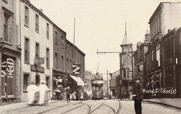 Old real photo postcard of Market Street, Colne