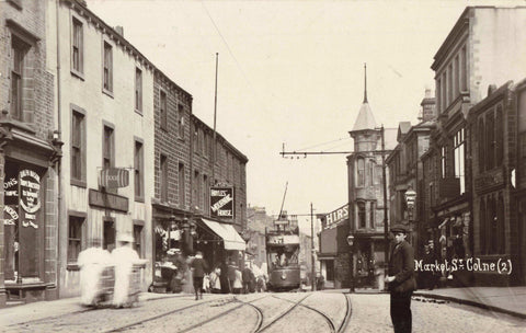 Old real photo postcard of Market Street, Colne