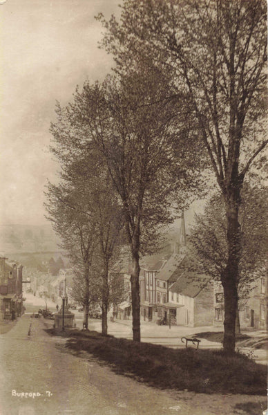 Old real photo postcard of Burford in Oxfordshire