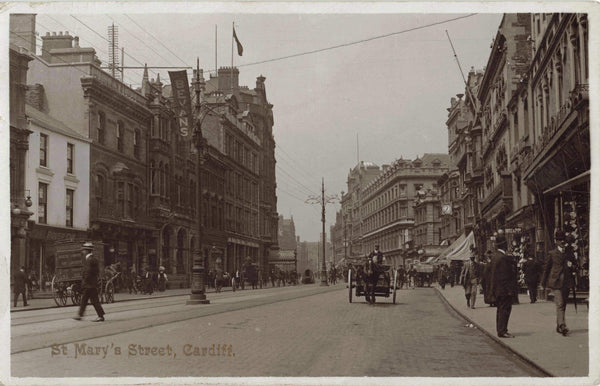 Old real photo postcard of St Mary's Street, Cardiff