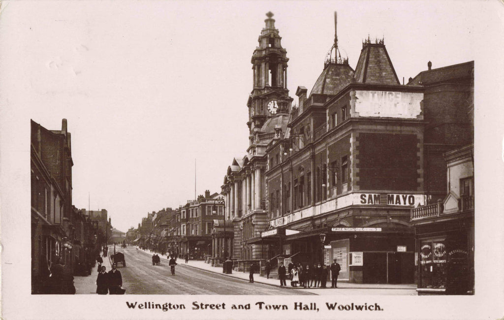 Old real photo postcard of Wellington Street and Town Hall, Woolwich, London