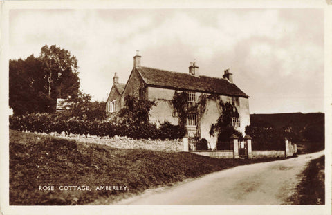 real photo postcard of Rose Cottage, Amberley in Gloucestershire