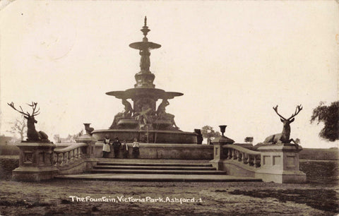 Old real photo postcard of the Fountain, Victoria Park, Ashford in Kent, 1914