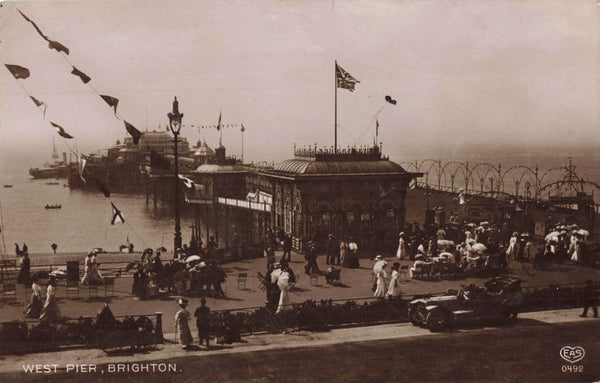 Old real photo postctard of The Pier, Brighton in Sussex