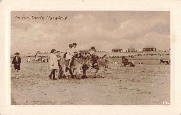 ON THE SANDS, CLEVELEYS - 1942 REAL PHOTO LANCASHIRE POSTCARD