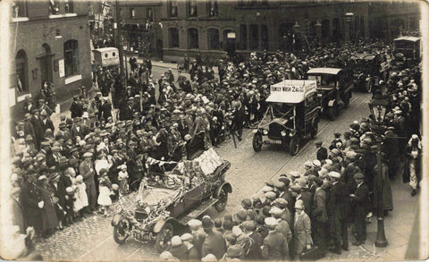 Old real photo postcard showing a procession thought to be in Altrincham