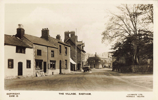 Old real photo postcard of Eastham Village, in Wirral, Cheshire