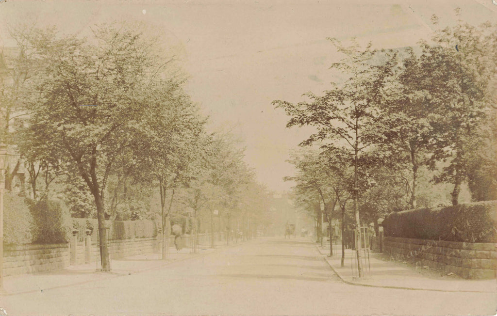 Old real photo postcard of Delamere Road, Altrincham in Cheshire