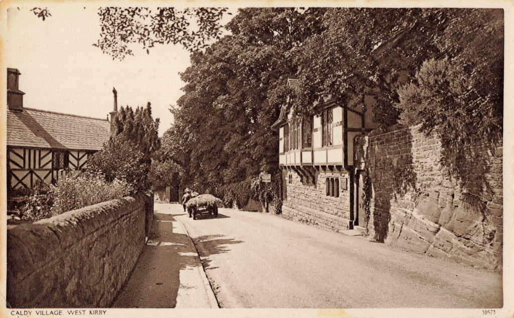 Old real photo postcard of Caldy Village, West Kirby, Wirral