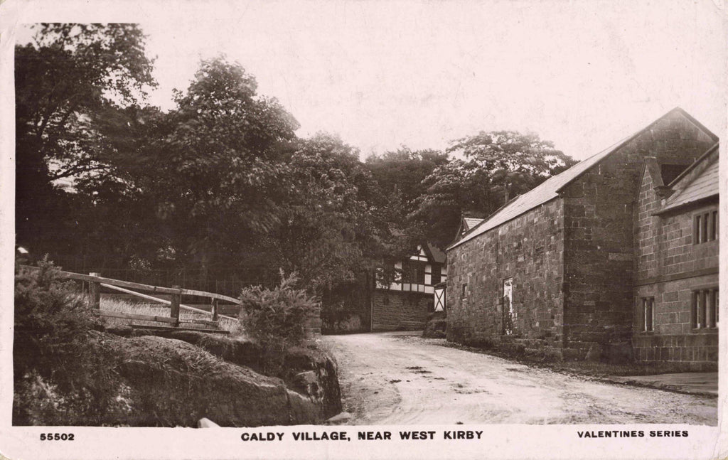 Old real photo postcard of Caldy Village near West Kirby in Wirral, Cheshire