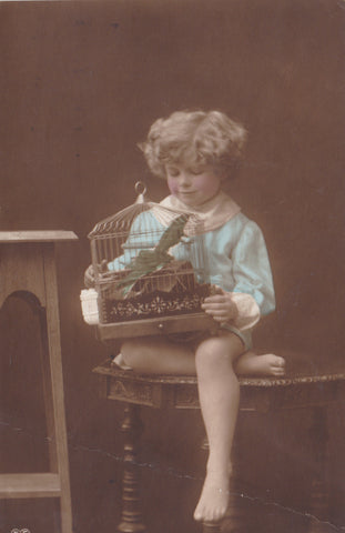 CHILD WITH BIRD IN CAGE - OLD POSTCARD