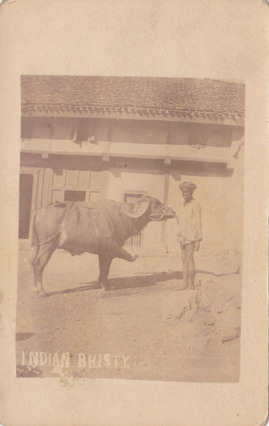 Old postcard of an Indian Bhisty, water carrier with buffalo