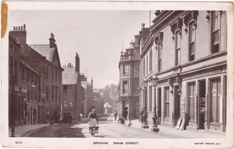 Old real photo postcard of Swan Street, Brechin in Angus, Scotland