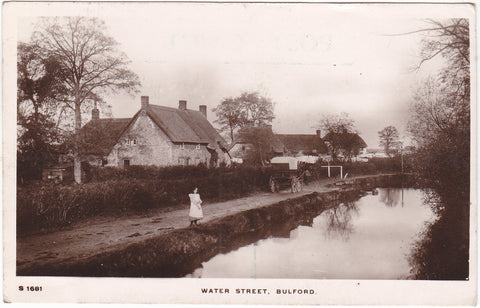 1911 real photo postcard of Water Street, Bulford in Wiltshire, postmarked Lark Hill Camp