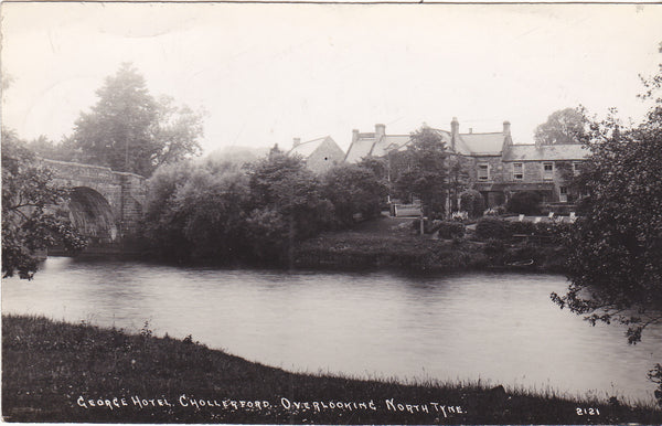 Real photo postcard of Chollerford showing George Hotel overlooking North Tyne