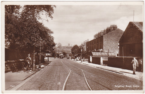 Old real photo postcard of Keighley Road, Colne in Lancashire