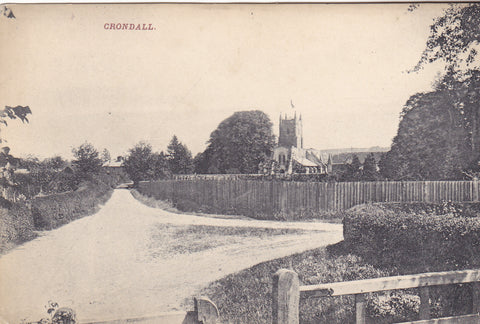Old postcard of Crondall in Hampshire, the writer says the Castle Inn can be seen