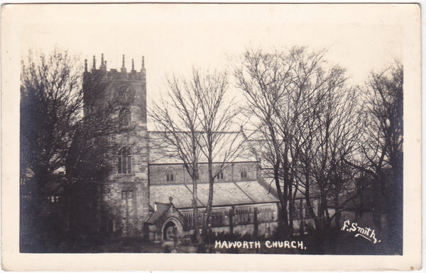 Old real photo postcard of Haworth Church, in Yorkshire