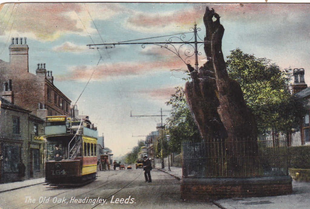 Old postcard of The Old Oak, Headingley, Leeds with a tram beside it