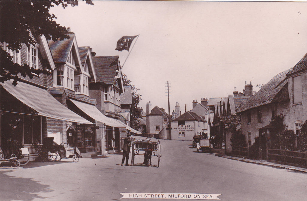 1910 real photo postcard of High Street, Milford on Sea in Hampshire