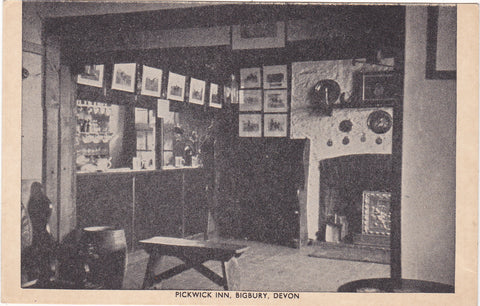 Old postcard of the interior of the Pickwick Inn, Bigbury in Devon
