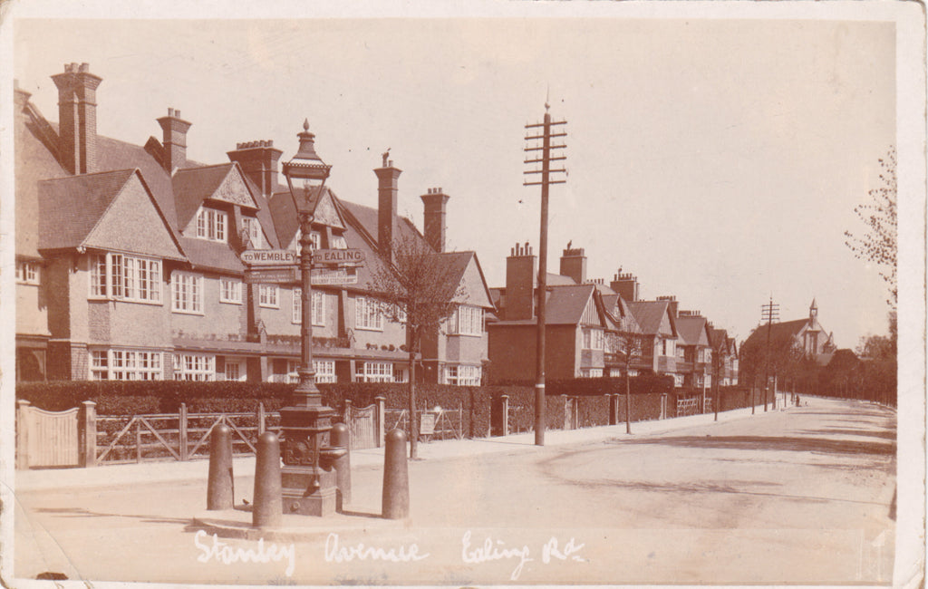 Old real photo postcard of Stanley Avenue, Ealing Road in Wembley London