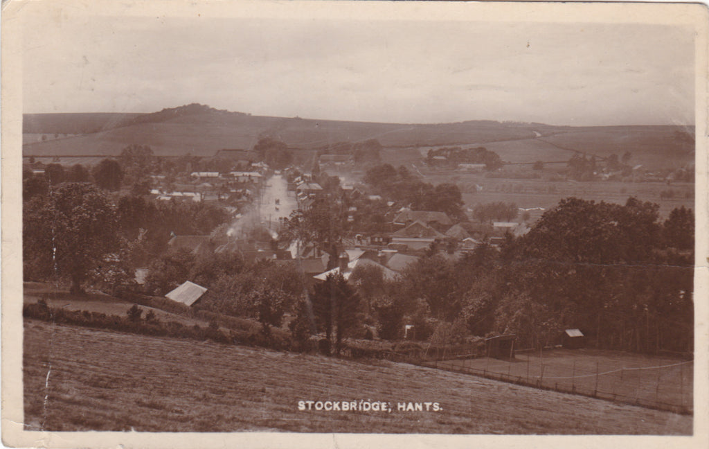 Old real photo postcard showing a view of Stockbridge, Hampshire