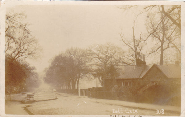 Old real photo postcard of Toll Gate, Dulwich, London